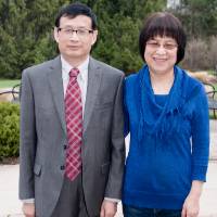 Award winner poses with wife (outdoors)